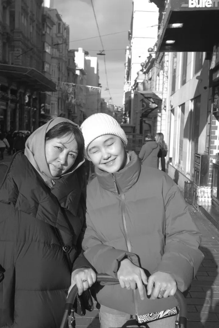 Family on a city walk, black and white